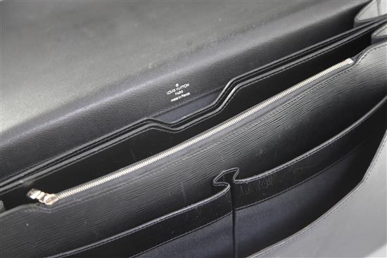 A Louis Vuitton black textured leather attaché case, 16.5in., with slip cover
